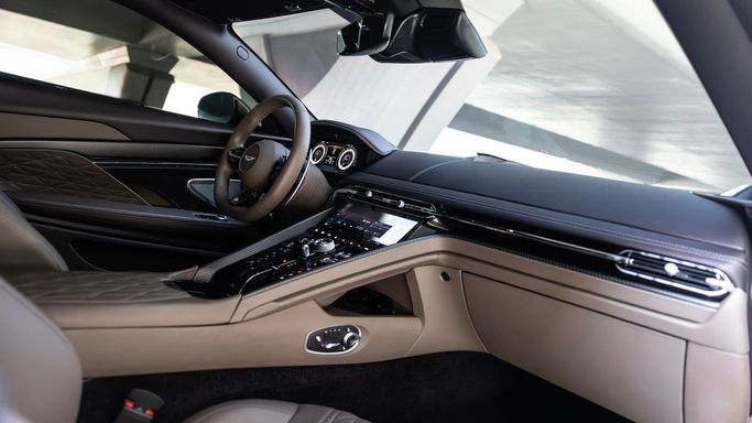 Aston Martin DB12, 2023 купе спорт класса в Дубае от AVA car rental бежевый цвет | AUTO.AE