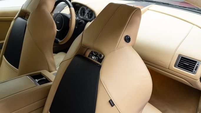 Подержанный Aston Martin DB9 I Рестайлинг, 5.9 л, 2009 в Дубае от Al Ain Class Motors Красный цвет. GCC | AUTO.AE