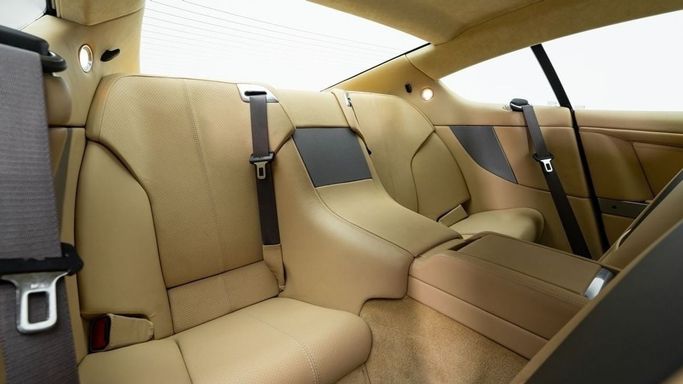 Подержанный Aston Martin DB9 I Рестайлинг, 5.9 л, 2009 в Дубае от Al Ain Class Motors Красный цвет. GCC | AUTO.AE