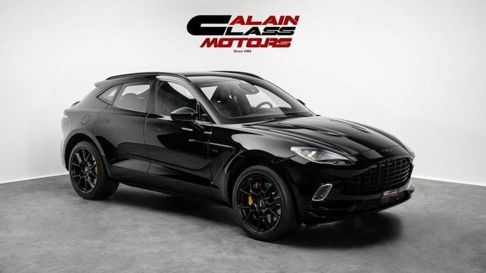 Подержанный Aston Martin DBX I, 4.0 л, 2021 в Дубае от Al Ain Class Motors Черный цвет. GCC | AUTO.AE