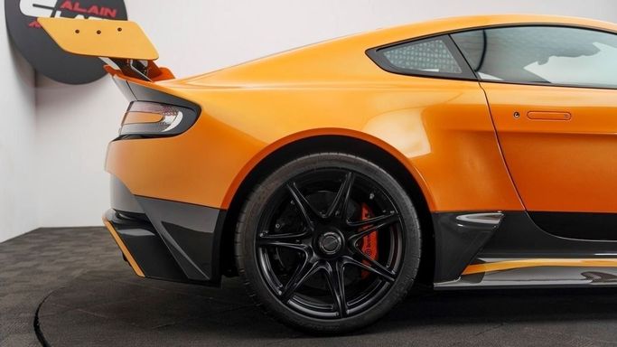 New Aston Martin V12 Vantage S I, 5.9 l, 2016 in Dubai by Al Ain Class Motors, Orange color. GCC Specs | AUTO.AE
