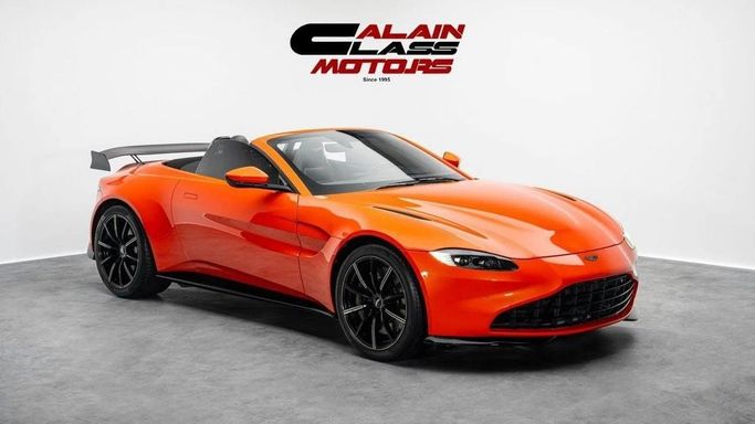 Used Aston Martin V8 Vantage IV, 4.0 l, 2022 in Dubai by Al Ain Class Motors, Orange color. European Specs | AUTO.AE