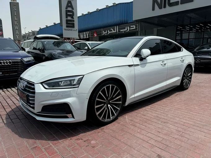 Подержанный Audi A5 II (F5), 2.0 л, 2018 в Дубае от Nice Cars Motos Белый цвет. GCC | AUTO.AE