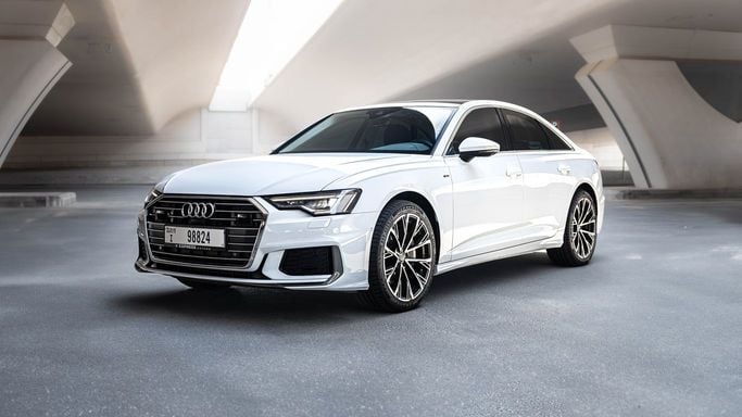 Audi A6 V (C8), 2021 standard sedan for rent in Dubai by AVA car rental, white color | AUTO.AE