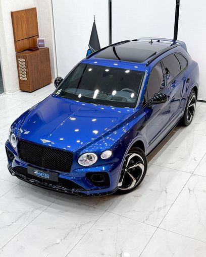 Used Bentley Bentayga EWB I Facelift, 4.0 l, 2022 in Dubai by 4 Matic Motors, Navy Blue color. GCC Specs | AUTO.AE