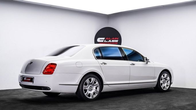 Подержанный Bentley Continental Flying Spur, 6.0 л, 2006 в Дубае от Al Ain Class Motors Белый цвет. GCC | AUTO.AE