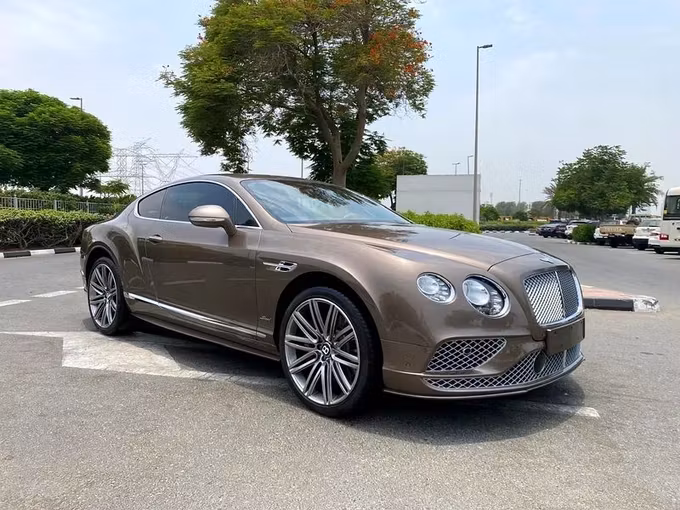 Подержанный Bentley Continental GT Speed II Рестайлинг, 6.0 л, 2016 в Дубае от Formula Motors Коричневый цвет. GCC | AUTO.AE