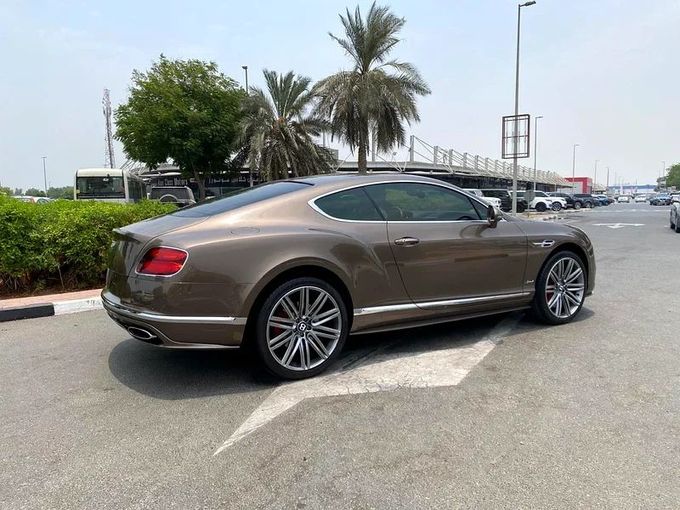 Подержанный Bentley Continental GT Speed II Рестайлинг, 6.0 л, 2016 в Дубае от Formula Motors Коричневый цвет. GCC | AUTO.AE