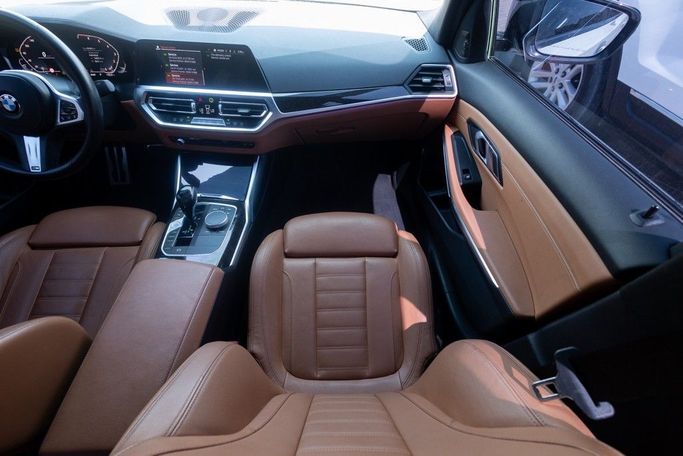 Used BMW 3 Series 330i VII (G2x), 2.0 l, 2021 in Dubai by Linda Cars, White color. GCC Specs | AUTO.AE