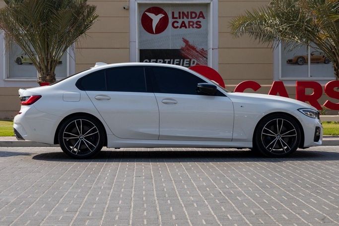 Used BMW 3 Series 330i VII (G2x), 2.0 l, 2021 in Dubai by Linda Cars, White color. GCC Specs | AUTO.AE