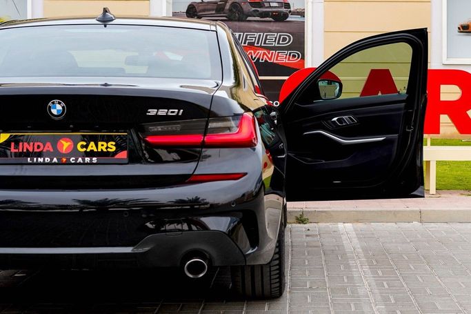 Used BMW 3 Series 320i VII (G2x), 2.0 l, 2021 in Dubai by Linda Cars, Black color. GCC Specs | AUTO.AE