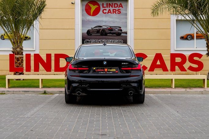 Used BMW 3 Series 320i VII (G2x), 2.0 l, 2021 in Dubai by Linda Cars, Black color. GCC Specs | AUTO.AE