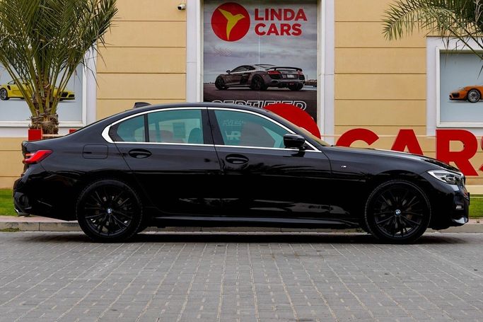 Used BMW 3 Series 320i VII (G2x), 2.0 l, 2021 in Dubai by Linda Cars, Black color. GCC Specs | AUTO.AE
