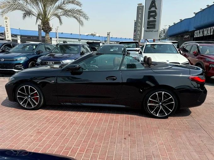Подержанный BMW 4 Series 430i G22, G23, G26, 2.0 л, 2023 в Дубае от Nice Cars Motos Черный цвет. GCC | AUTO.AE