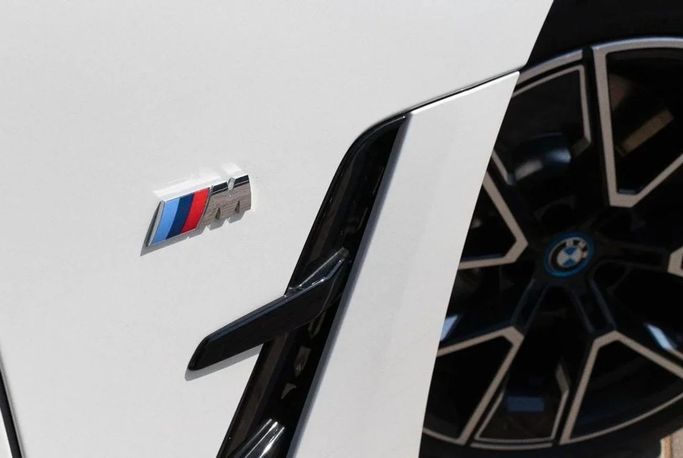 New BMW i4 eDrive35 G26 Facelift, 2024 in Dubai by Albustanji Motors FZCO, White color.  | AUTO.AE