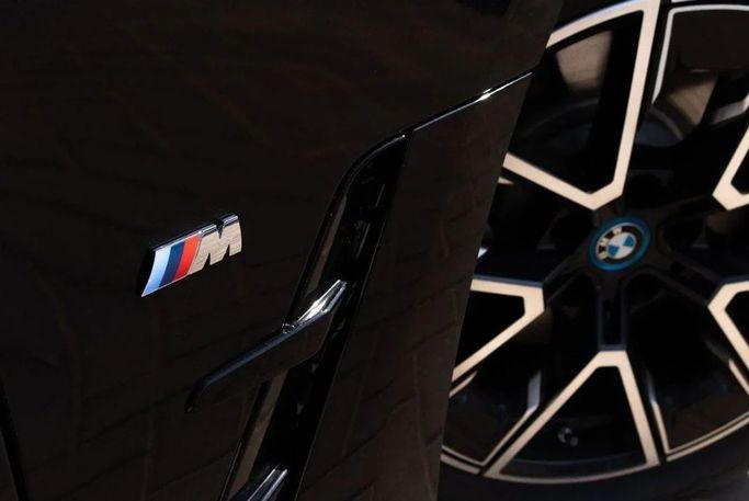 New BMW i4 eDrive40 G26 Facelift, 2025 in Dubai by Albustanji Motors FZCO, Black color.  | AUTO.AE