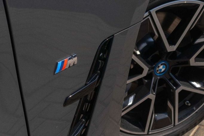 New BMW i4 eDrive40 G26 Facelift, 2025 in Dubai by Albustanji Motors FZCO, Grey color.  | AUTO.AE