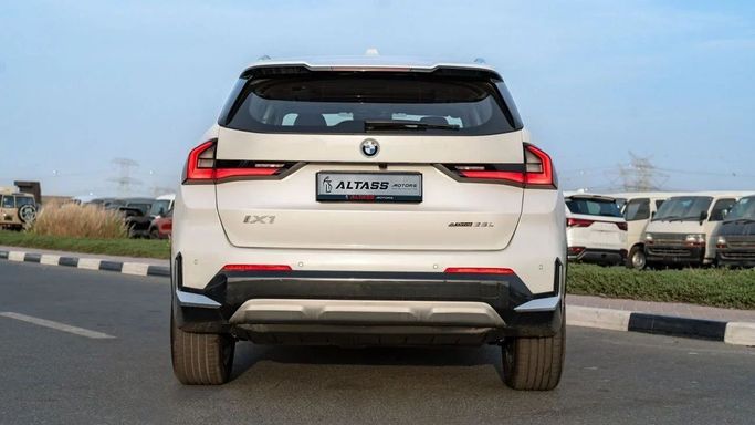 New BMW iX1 eDrive, 2022 in Dubai by Altass Motors, White color. Other | AUTO.AE