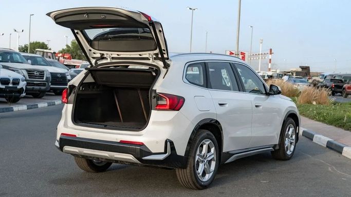 New BMW iX1 eDrive, 2022 in Dubai by Altass Motors, White color. Other | AUTO.AE