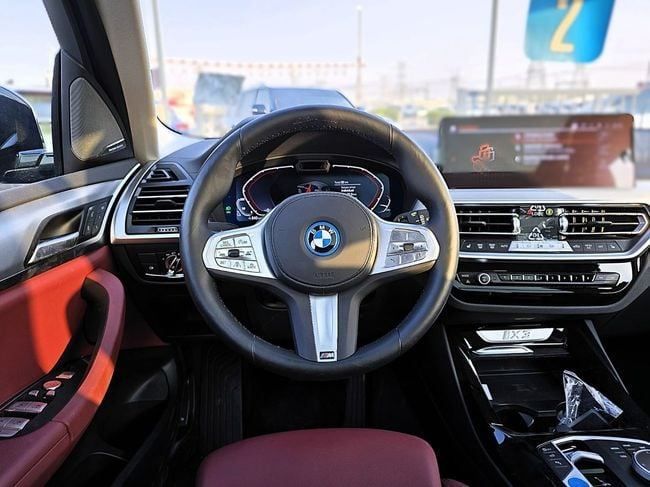 New BMW iX3 I (G08) Facelift, 2025 in Dubai by Soltan Auto, Black color. Chinese Specs | AUTO.AE