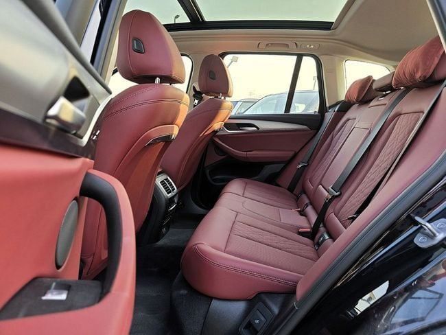 New BMW iX3 I (G08) Facelift, 2025 in Dubai by Soltan Auto, Black color. Chinese Specs | AUTO.AE