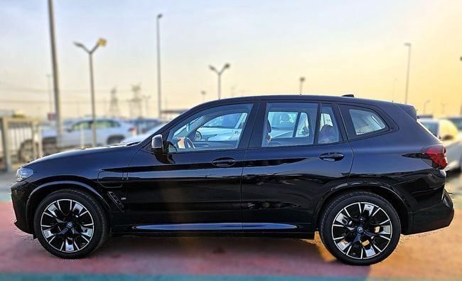 New BMW iX3 I (G08) Facelift, 2025 in Dubai by Soltan Auto, Black color. Chinese Specs | AUTO.AE
