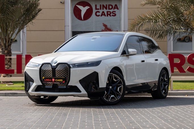 Used BMW iX xDrive50 I (I20), 2023 in Dubai by Linda Cars, White color. GCC Specs | AUTO.AE