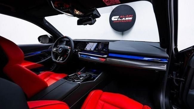 New BMW M5 VII (G90), 4.4 l, 2025 in Dubai by Al Ain Class Motors, Black color. GCC Specs | AUTO.AE