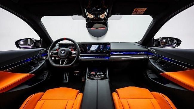 New BMW M5 VII (G90), 4.4 l, 2025 in Dubai by Al Ain Class Motors, Purple color. GCC Specs | AUTO.AE