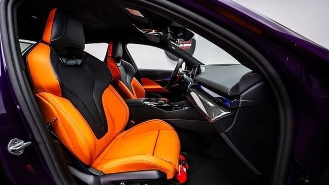 New BMW M5 VII (G90), 4.4 l, 2025 in Dubai by Al Ain Class Motors, Purple color. GCC Specs | AUTO.AE