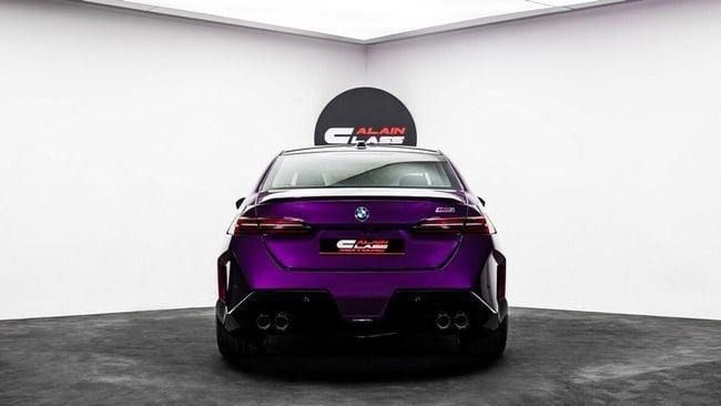 New BMW M5 VII (G90), 4.4 l, 2025 in Dubai by Al Ain Class Motors, Purple color. GCC Specs | AUTO.AE