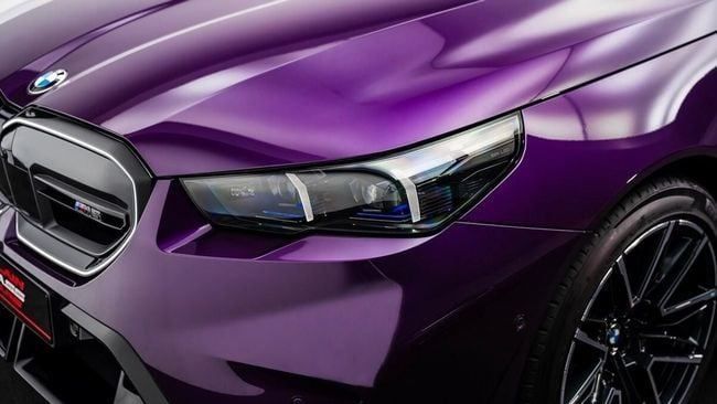 New BMW M5 VII (G90), 4.4 l, 2025 in Dubai by Al Ain Class Motors, Purple color. GCC Specs | AUTO.AE