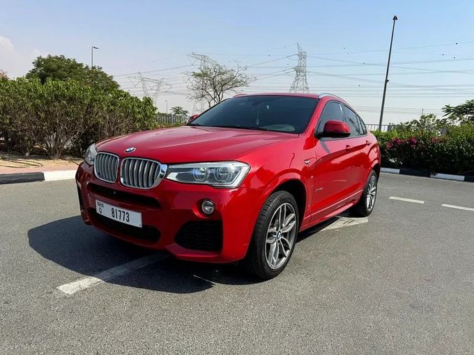 Подержанный BMW X4 28i I (F26), 2.0 л, 2016 в Дубае от Nice Cars Motos Красный цвет. GCC | AUTO.AE