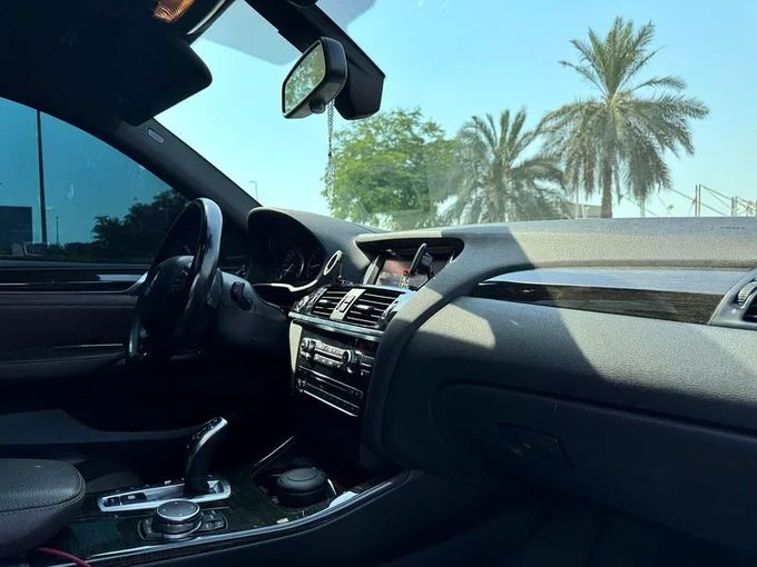 Подержанный BMW X4 28i I (F26), 2.0 л, 2016 в Дубае от Nice Cars Motos Красный цвет. GCC | AUTO.AE