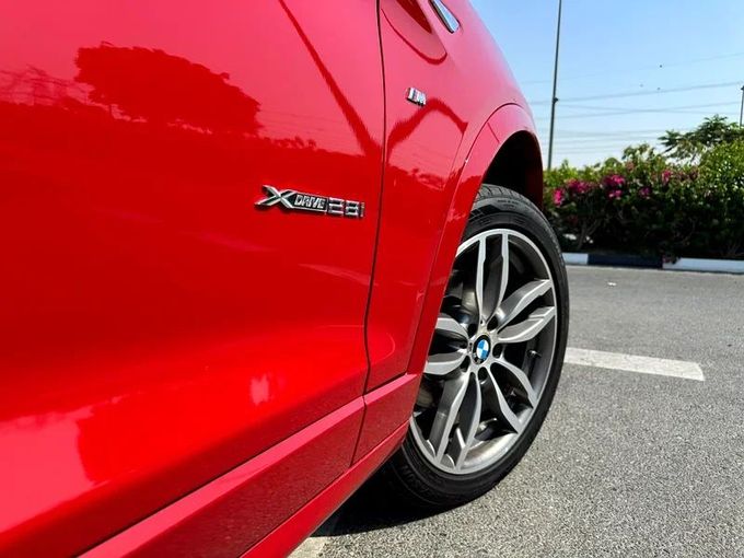 Подержанный BMW X4 28i I (F26), 2.0 л, 2016 в Дубае от Nice Cars Motos Красный цвет. GCC | AUTO.AE