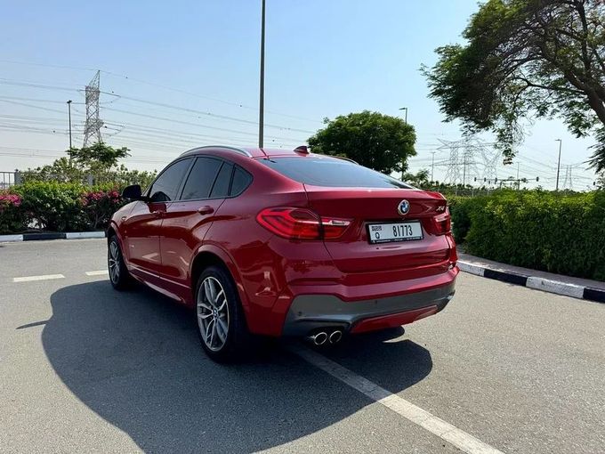 Подержанный BMW X4 28i I (F26), 2.0 л, 2016 в Дубае от Nice Cars Motos Красный цвет. GCC | AUTO.AE