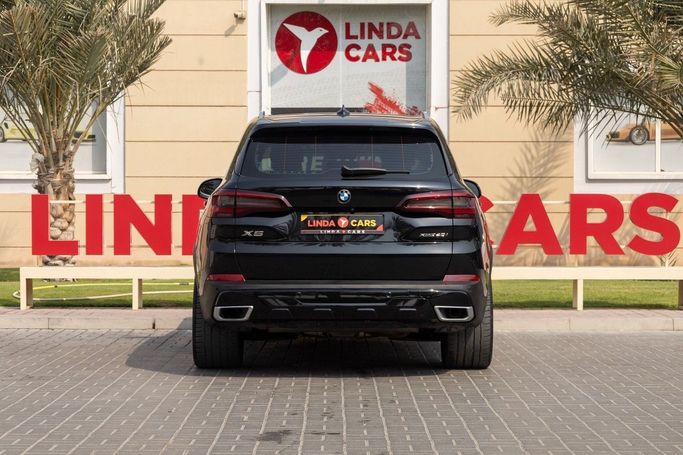 Used BMW X5 40i IV (G05), 3.0 l, 2021 in Dubai by Linda Cars, Black color. GCC Specs | AUTO.AE