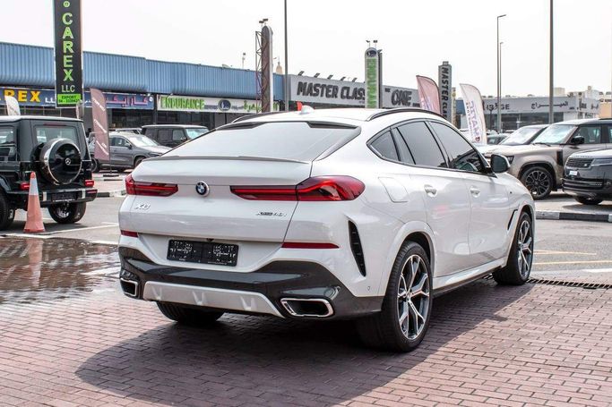 Подержанный BMW X6 40i III (G06), 3.0 л, 2020 в Дубае от Golbal Net Work Белый цвет. GCC | AUTO.AE