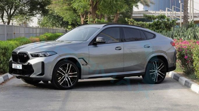 New BMW X6 M60i III (G06) Facelift, 4.4 l, 2025 in Dubai by Auto Max Group, Grey color. GCC Specs | AUTO.AE