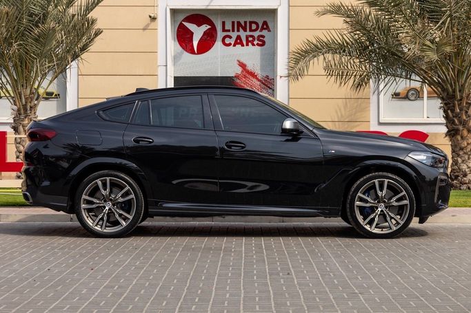 Подержанный BMW X6 M50i III (G06), 4.4 л, 2023 в Дубае от Linda Cars Черный цвет. GCC | AUTO.AE