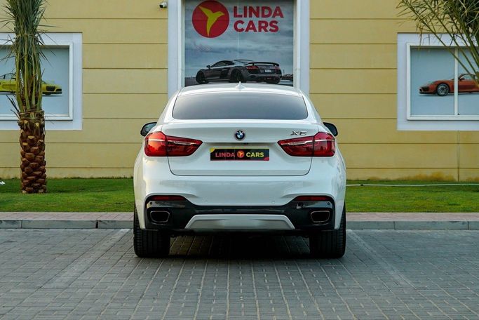 Used BMW X6 50i II (F16), 4.4 l, 2015 in Dubai by Linda Cars, White color. European Specs | AUTO.AE