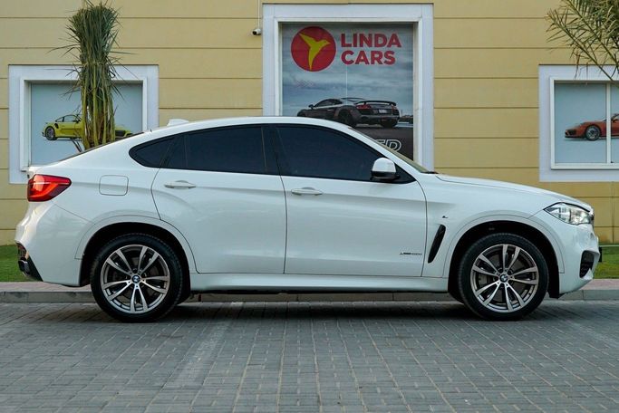 Used BMW X6 50i II (F16), 4.4 l, 2015 in Dubai by Linda Cars, White color. European Specs | AUTO.AE