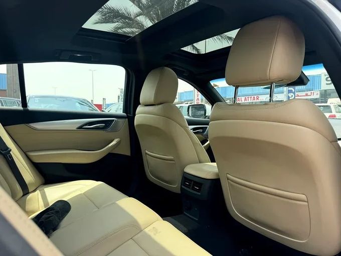 Подержанный Cadillac CT5 I, 2.0 л, 2021 в Дубае от Nice Cars Motos Белый цвет. GCC | AUTO.AE