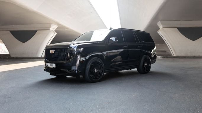 Cadillac Escalade V, 2023 business suv 5 dr. for rent in Dubai by AVA car rental, black color | AUTO.AE