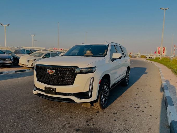 Used Cadillac Escalade V, 6.2 l, 2023 in Dubai by Lakhani Motors, White color. American Specs | AUTO.AE