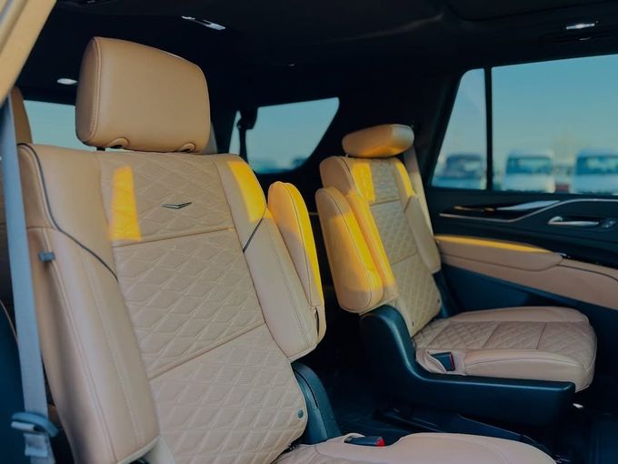 Used Cadillac Escalade V, 6.2 l, 2023 in Dubai by Lakhani Motors, White color. American Specs | AUTO.AE