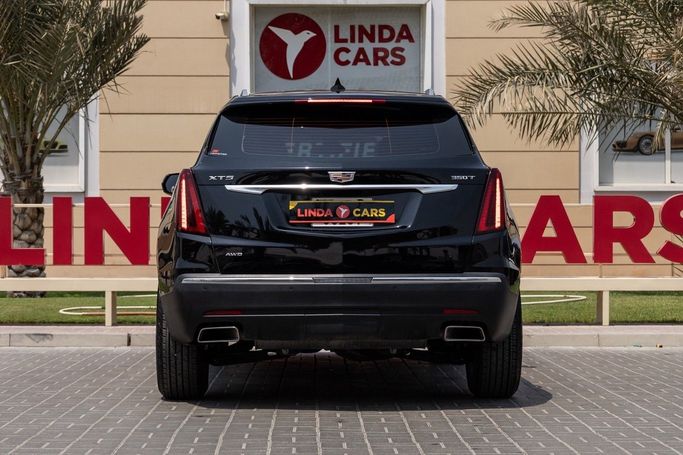 Подержанный Cadillac XT5 I Рестайлинг, 2.0 л, 2023 в Дубае от Linda Cars Черный цвет. GCC | AUTO.AE