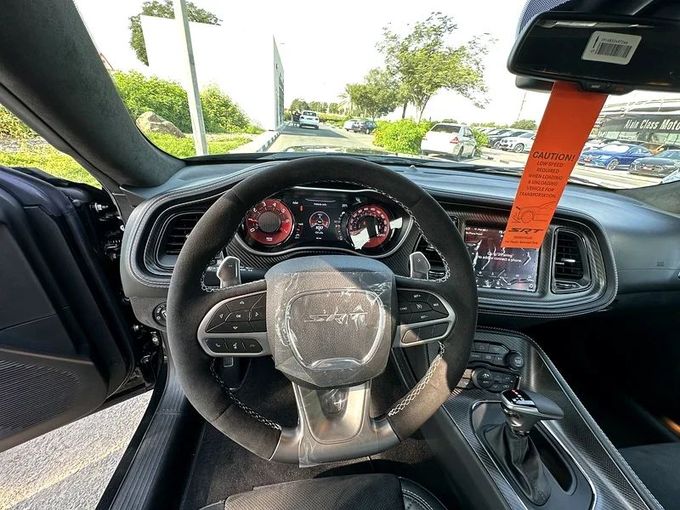 New Dodge Challenger III Facelift 2, 3.6 l, 2023 in Dubai by Formula Motors, Black color. GCC Specs | AUTO.AE