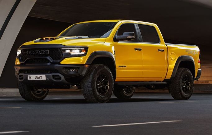 Dodge RAM IV (DS/DJ), 2023 sport pickup double cab crew cab for rent in Dubai by AVA car rental, golden color | AUTO.AE