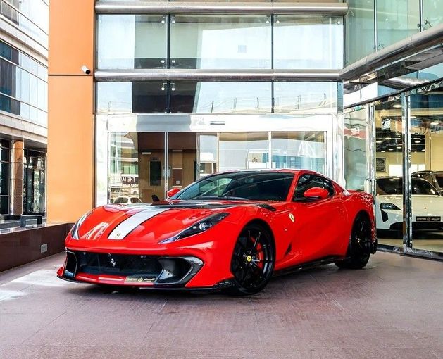 Used Ferrari 812 Competizione, 6.5 l, 2022 in Dubai by Q Motors, Red color. GCC Specs | AUTO.AE